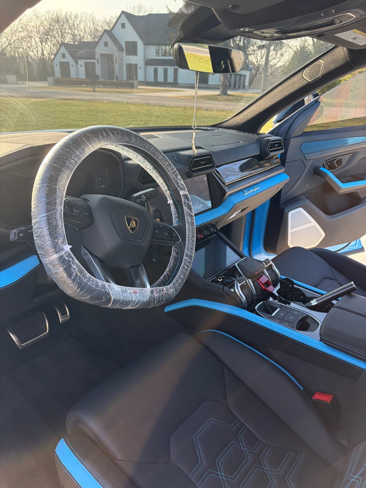 Lamborghini Urus with a blue and black interior after a detail